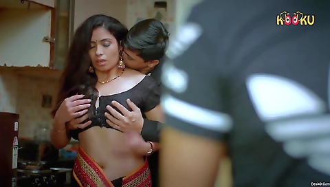 Black dress brunette babe with a big body is dancing in front