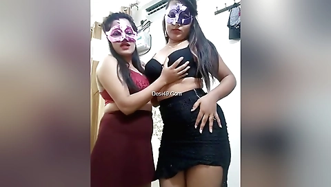 Busty brunette girls in sexy dresses watching each other from behind