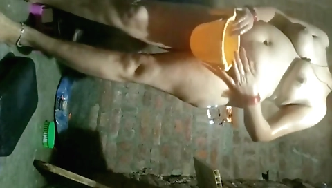 Horny Indian woman enjoys a hot masturbation in the bathtub