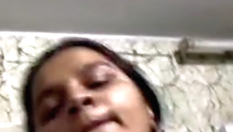 Buxom brunette shows herself on webcam with her huge tits