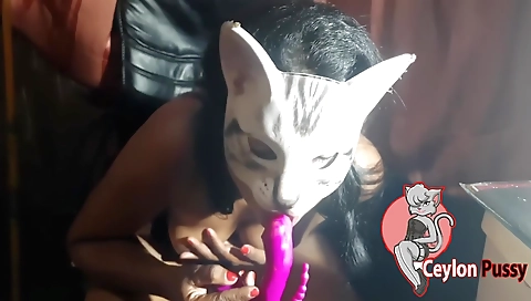 Amature brunette girl rubs her hairy pussy with a big dildo