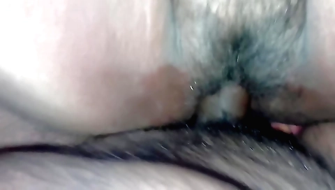 Indian amateur slut in a dress stretches hairy bush