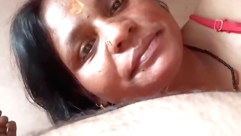 Mature brunette in the camera lens moans for her lover