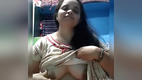 Sexy indian milf shows off her large boobs on webcam video