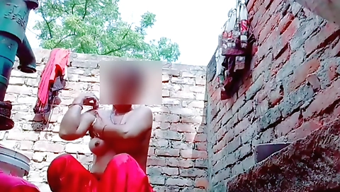 Indian woman riding her bike on a bike in a beautiful bikini