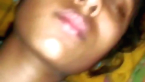 Indian brunette slut masturbating on bed in amateur video