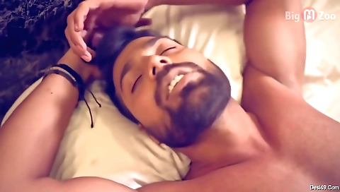 Brunette in a white dress on a bed is stripping naked