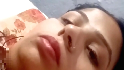 Indian hot girl is playing with her clit in her bedroom