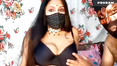 Indian brunette is wearing a sexy outfit in a video
