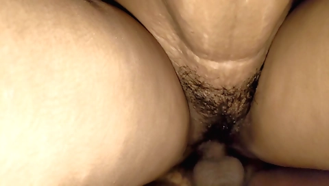 Amateur teen is showing us how she touches her hairy pussy