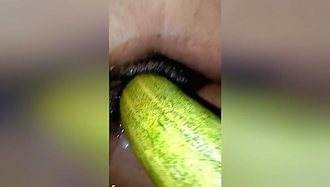 Indian amateur girl masturbates with a 9 inch cucumber