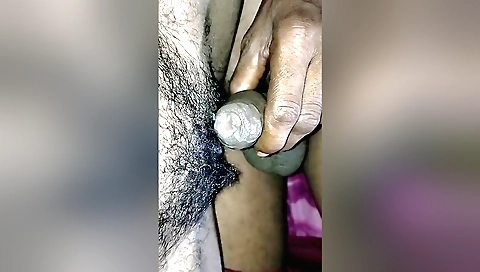 Indian woman in a sexy bikini plays with her hairy pussy