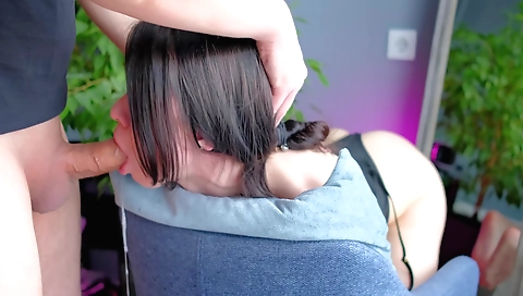 Amateur brunette is standing out in the open field