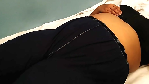 Horny brunette in a white blouse and skirt gets naked