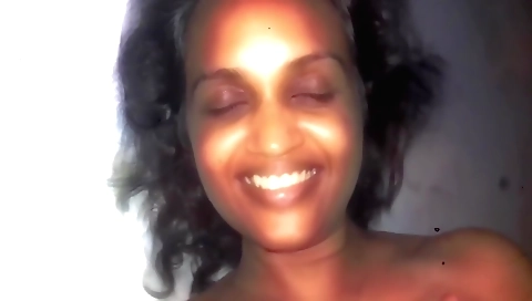 Brunette beauty with a juicy face is doing solo porn