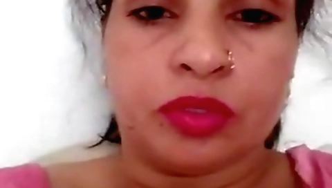 Milf with nice tits enjoys herself sucking a dildo