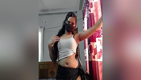 Sexy brunette in a white dress and black stockings