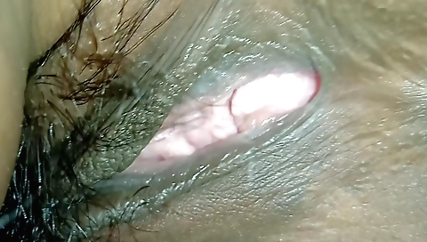 Indian hairy babe with a big ass shows her hairy pussy