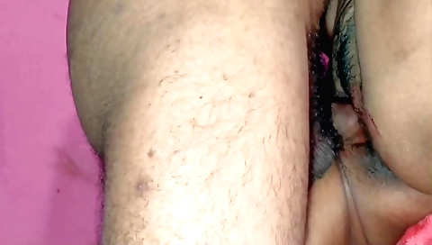 Hairy brunette in t-shirt and shorts with a small hair pad