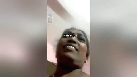 Mature brunette takes a sexy bath and shows her natural tits