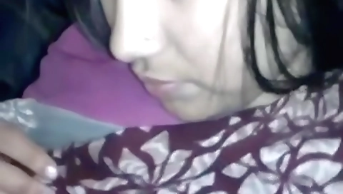 Indian brunette video with a dildo and a naked girl