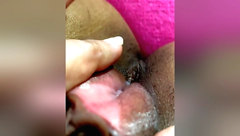 Solo female masturbating in the bathroom in her black bikini