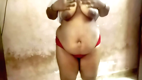 Indian chick with big tits sits on a table with husband