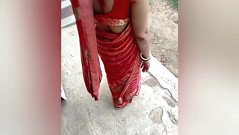 Indian wife in a black dress outdoor show her body