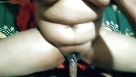 Buxom brunette shows off her big boobs and her huge booty