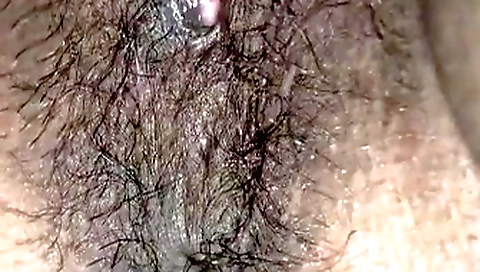 Natural boobs hairy chick fucks herself in a lingerie