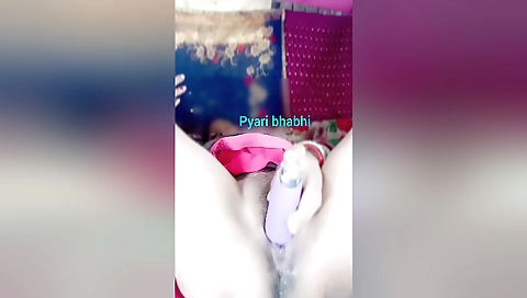 Indian girl is playing with her toy and filling her pussy